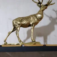 مجسمه گوزن برنز طاووس برنز و میوه خوری برنز