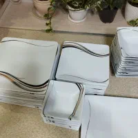 دو دست سرویس چینی تقدیس