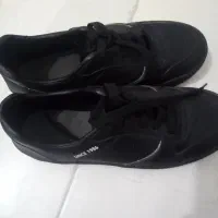 کفش|کیف، کفش، کمربند|رشت, فلسطین|دیوار