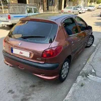 پژو ۲۰۶ شکلاتی عروسک
