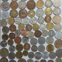 هزاران سکه خارجی از ۱۰۰ ها کشور جهان