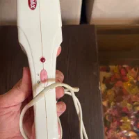 اتو موی شونه ای و حرارتی