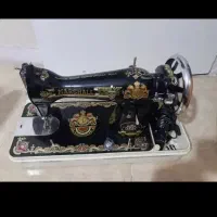 چرخ خیاطی برقی و قابلمه بخار پز استیل