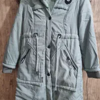 کاپشن|لباس|کهنوج, |دیوار