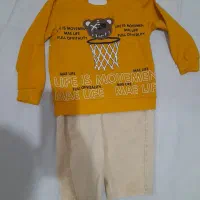 لباس بچگانه و کلاه وسوییشرت