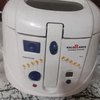 سرخ کن|ظروف پخت‌وپز|مبارکه, |دیوار