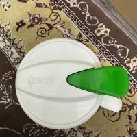 ظرف نگهدارنده رب زینوین