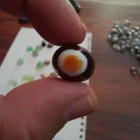 نگین چهار گوش باباقوری تقریباً مشابه عکس