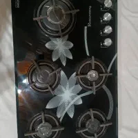 گاز رو میزی شیشه ای در حدنو کاملا تمیز و سالم