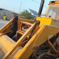 یک دستگاه بیل بکهو|ماشینآلات صنعتی|خمیر, |دیوار