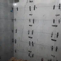 کاشی کاری وسرامیک کاری وکلیه کارهای بنایی