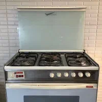اجاق گاز ۵ شعله همراه با فر و جوجه گردان