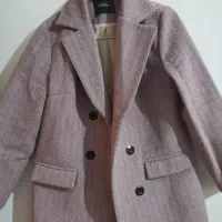 تعدادی کت و پالتو در حد نو