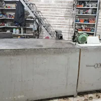 میز کار.پمپ باد. دستگاه شارژ باطری . گیره.