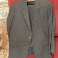 یک دست کت و شلوار مردانه