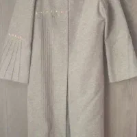 پالتو و تعدادی لباس نو و کارکرده