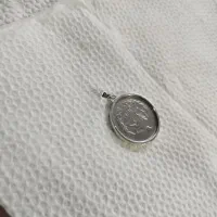 پلاک نقره از سکه ی قدیمی