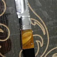 چاقو و تسبیح سندلوس