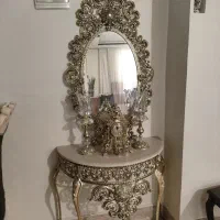 اینه و شمعدان با ساعت