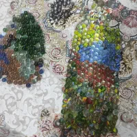 تیله شیشه‌ای بازی