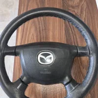 فرمان مزدا ۳۲۳