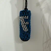 غلاف فندک زندان بافت یسر تسبیح دمپایی