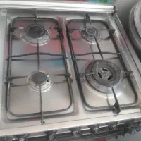 اجاق گاز تمام استیل ۴ شعله سینجر