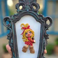 تابلو عروسک قرتی