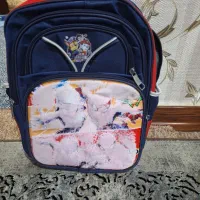 دوتا کیف مدرسه|کیف، کفش، کمربند|اهواز, زیتون کارگری|دیوار