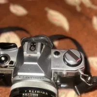 دوربین آنالوگ Canon Ae1 . همراه با لنز CANON|دوربین عکاسی و فیلم‌برداری|تهران, امیرآباد|دیوار