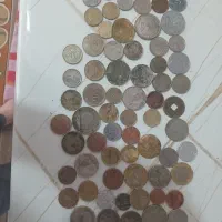 تعدادی سکه خارجی فروشی