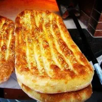 ‌شاگرد نان روغنی