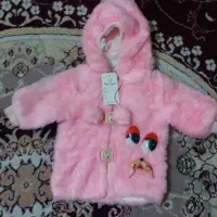 کاپشن صورتی نوزاد