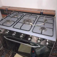 گاز پنج شعله و میز نهار خوری