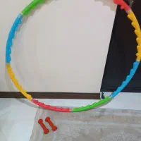 حلقه ورزشی و دمبل نیم کیلویی