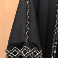 عبا|لباس|مشهد, توس فردوسی|دیوار