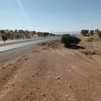 فروش فوری ۳/نیم هکتارزمین بهرجاده خرم آباد کوهدشت