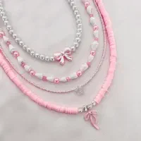 گردنبند پینترستی پاپیونی با تم صورتی