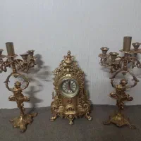 ساعت و۲عدد شمعدان
