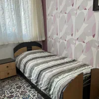 تختخواب یک نفره به همراه تشک و پاتختی