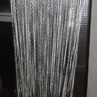 لوازم منزل شامل پرده، کتاب و وسایل فوتبال دستی