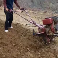 شخم زدن زمین با تیلر
