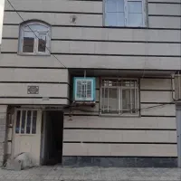 ساختمان-دوطبقه-نما-سنگ-سفیدار