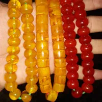 تسبیح کهربا کره عسلی و سرخ بودار معاوضه با انگشتر