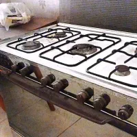 اجاق گاز و مبل هشت نفره