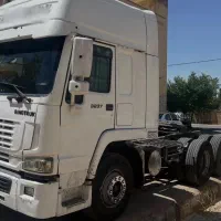 هوو ۲۰۰۶معاوضه با کمپرسی و بیل مکانیکی