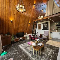 کلبه سویسی تک خواب زرین|اجارهٔ کوتاهمدت ویلا و باغ|رویان, |دیوار