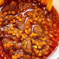 تهیه غذای خانگی با گوشت گرم و برنج هاشمی در سیاهکل
