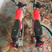 موتور هوندا 125باک قرمز ۲ عدد اسباب بازی