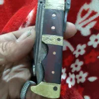 یک چاقوی قدیمی کلکسیونی فولادی